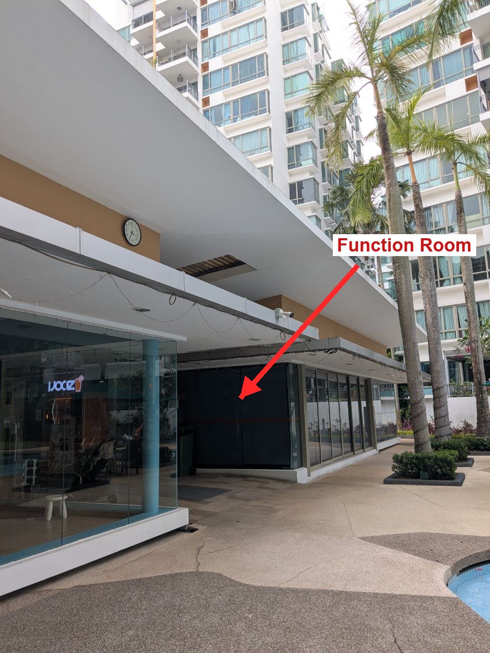 Arrow pointing to the Function Room's dark glass front